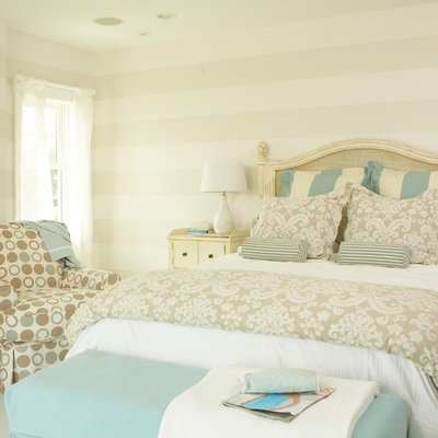 Bedroom - mid-sized coastal master painted wood floor and blue floor bedroom idea in Tampa with beige walls and no fireplace