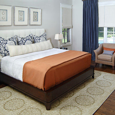 Example of a classic master dark wood floor bedroom design in Dallas with gray walls and no fireplace