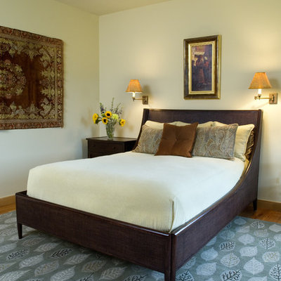 Bedroom - traditional bedroom idea in Other with beige walls