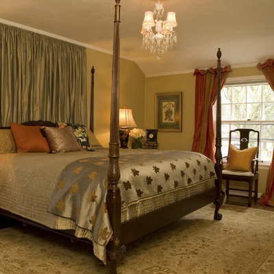Example of a classic bedroom design in Portland with beige walls