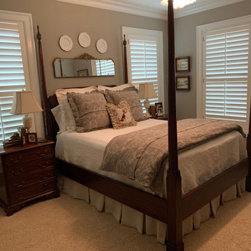 Traditional Bedroom Featuring a Pencil Post Bed and Nightstands