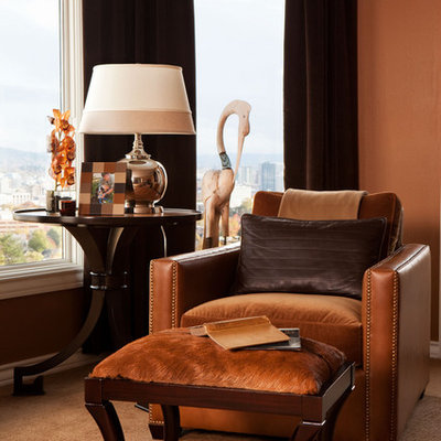 Inspiration for a timeless carpeted bedroom remodel in Portland with orange walls