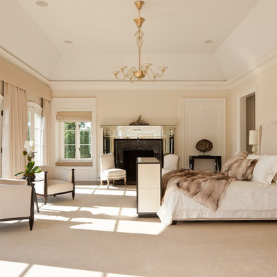 Inspiration for a timeless bedroom remodel in New York with beige walls