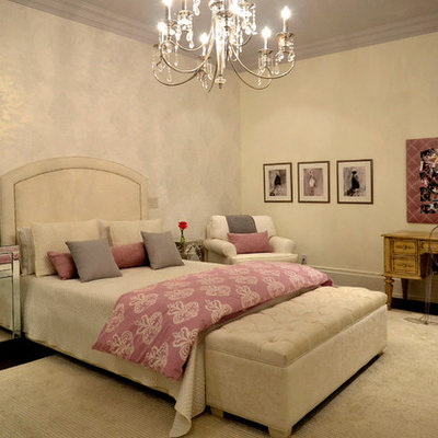Elegant dark wood floor bedroom photo in Toronto with beige walls and no fireplace