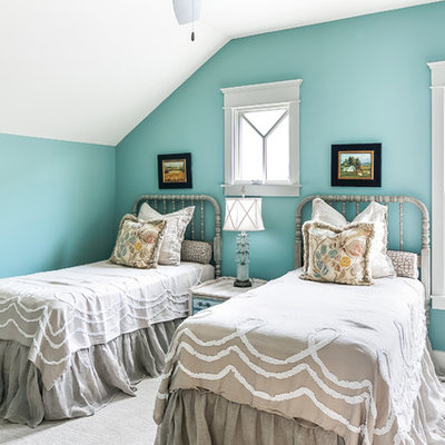 Example of a farmhouse guest carpeted bedroom design in Louisville with blue walls
