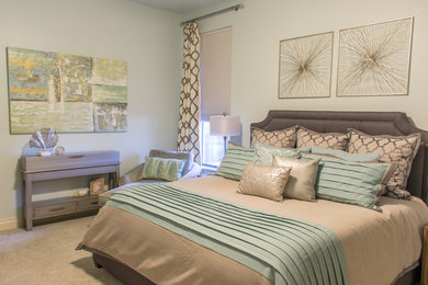 Transitional master carpeted and beige floor bedroom photo in Oklahoma City with blue walls