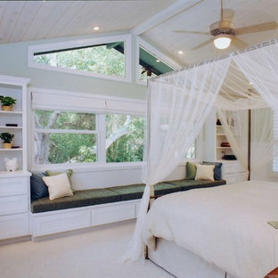 Island style master bedroom photo in Hawaii with green walls and no fireplace