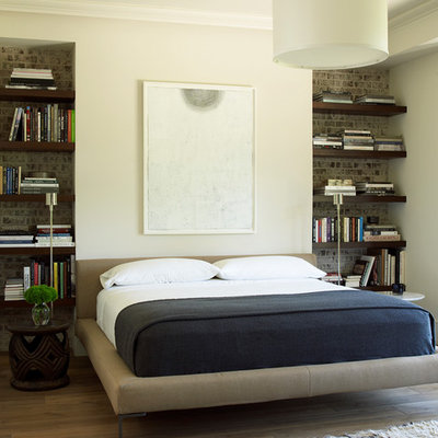 Bedroom - transitional dark wood floor bedroom idea in Houston with beige walls