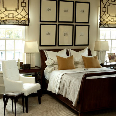 Example of a transitional carpeted bedroom design in Atlanta with beige walls and no fireplace