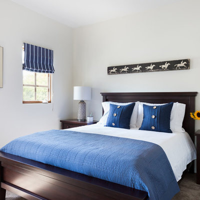Mid-sized transitional master carpeted and beige floor bedroom photo in Los Angeles with white walls