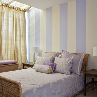 Inspiration for a contemporary bedroom remodel in New York with purple walls