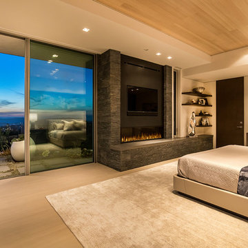 Trousdale Beverly Hills luxury home modern primary bedroom with floor to ceiling