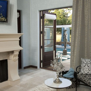 Inspiration for an eclectic bedroom in Other with a standard fireplace.