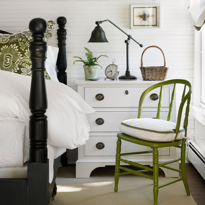 Beach style dark wood floor bedroom photo in Chicago with white walls