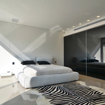 TV wardrobe in a black design bedroom