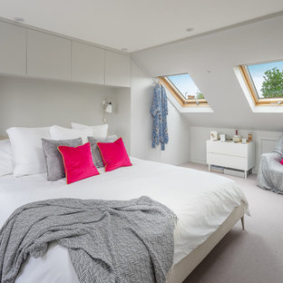 Design ideas for a medium sized contemporary bedroom in London with grey walls, carpet and grey floors.