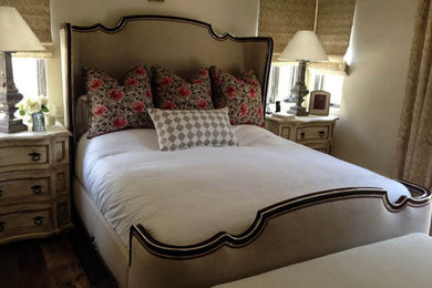 Bedroom - mid-sized traditional master medium tone wood floor bedroom idea in Orange County with beige walls