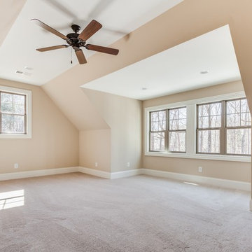 Upstairs room with slanted ceiling