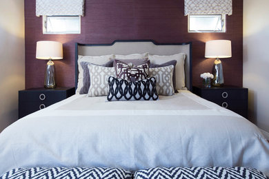 Inspiration for a mid-sized contemporary master medium tone wood floor bedroom remodel in San Diego with purple walls and no fireplace