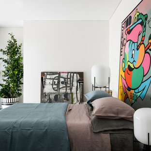 This is an example of an eclectic master bedroom in Perth with white walls, concrete floors and grey floor.