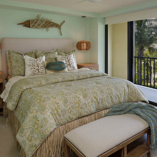 Bedroom - coastal carpeted bedroom idea in Tampa with green walls
