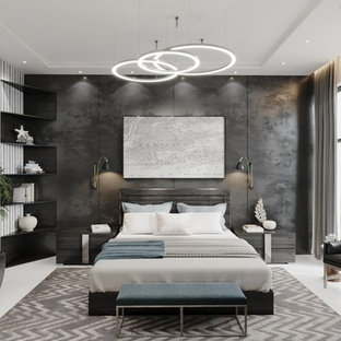 Imagen de dormitorio tipo loft, contemporáneo, grande, sin chimenea, con paredes negras, suelo de baldosas de cerámica y suelo beige