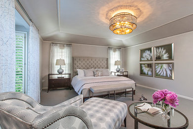 Inspiration for a large transitional master carpeted bedroom remodel in Detroit with gray walls and no fireplace
