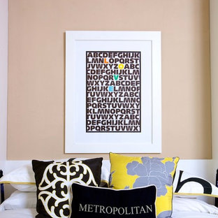 Inspiration for a contemporary bedroom in Sacramento with beige walls.