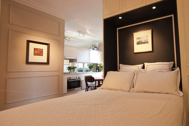 Ejemplo de habitación de invitados clásica renovada pequeña con paredes blancas