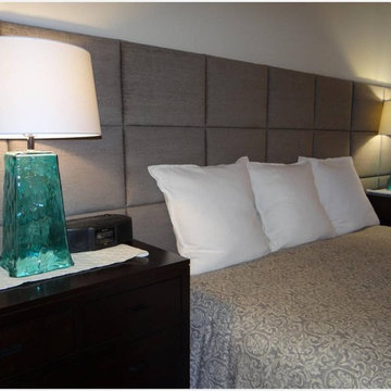 Wall of upholstered panels