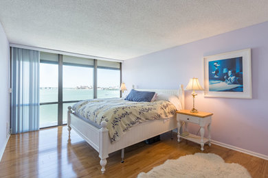 Example of a beach style bedroom design in Tampa