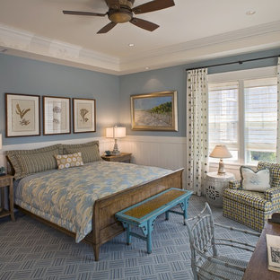 Example of a large beach style carpeted and blue floor bedroom design in Philadelphia with blue walls and no fireplace