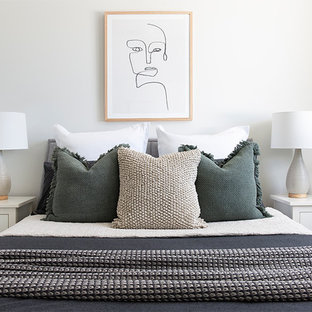 Inspiration for a scandinavian bedroom in Brisbane with white walls.
