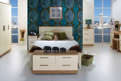 This is an example of a contemporary bedroom in Cardiff.