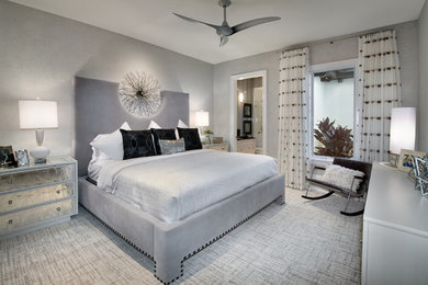 Design ideas for a contemporary grey and silver bedroom in Miami.