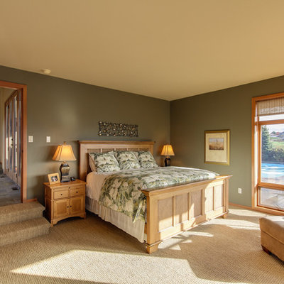 Example of a classic carpeted bedroom design in Seattle with gray walls