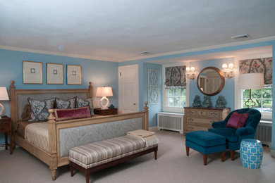 Mid-sized elegant guest carpeted bedroom photo in Bridgeport with blue walls and a standard fireplace