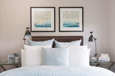 This is an example of a medium sized modern guest bedroom in Brisbane with beige walls, carpet and grey floors.