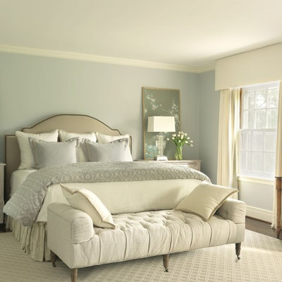 Inspiration for a timeless bedroom remodel in St Louis with blue walls