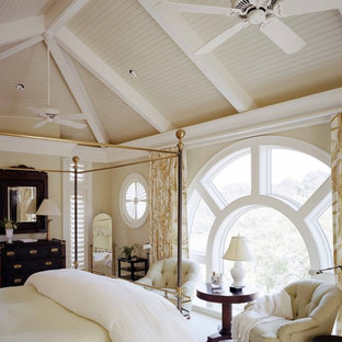 Inspiration for a large timeless guest carpeted bedroom remodel in Atlanta with beige walls