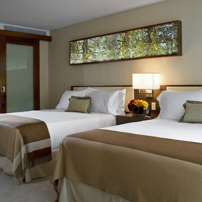 Bedroom - mid-sized contemporary guest carpeted bedroom idea in Vancouver with beige walls