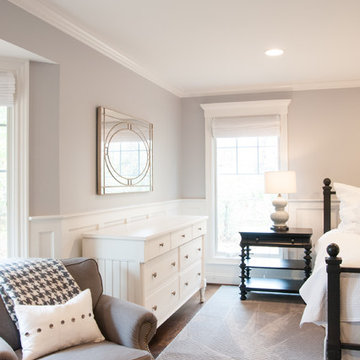 White and Gray Master Suite With Wainscoting