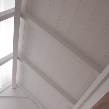 White Wood Ceiling and Exposed Rafters