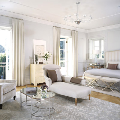 Example of a transitional bedroom design in Los Angeles with gray walls