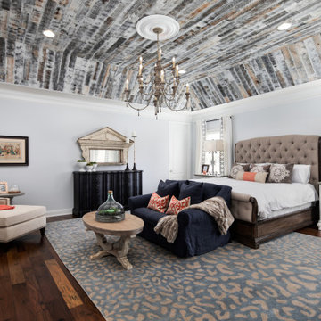 Wood Tray Ceiling with Pops of Coral Master Suite