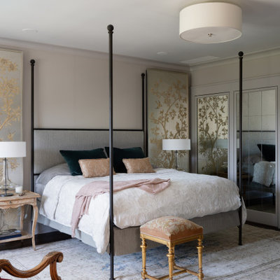 Inspiration for a large mediterranean master dark wood floor and gray floor bedroom remodel in Austin with beige walls
