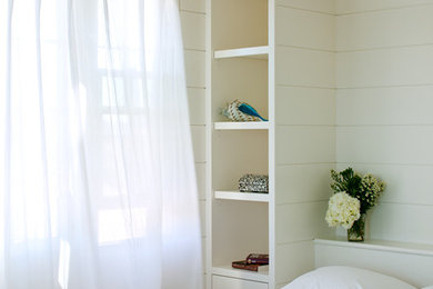 Bedroom - small coastal guest light wood floor bedroom idea in Boston with white walls