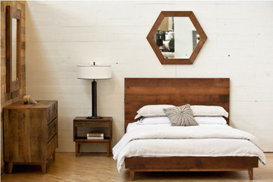 Mid-sized mountain style guest light wood floor and brown floor bedroom photo in Orange County with white walls and no fireplace