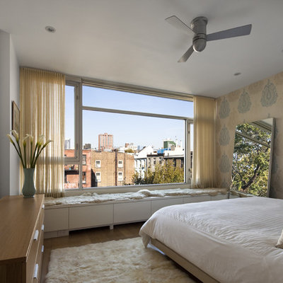 Bedroom - contemporary master bedroom idea in New York with multicolored walls