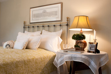 Elegant bedroom photo in Boston with beige walls